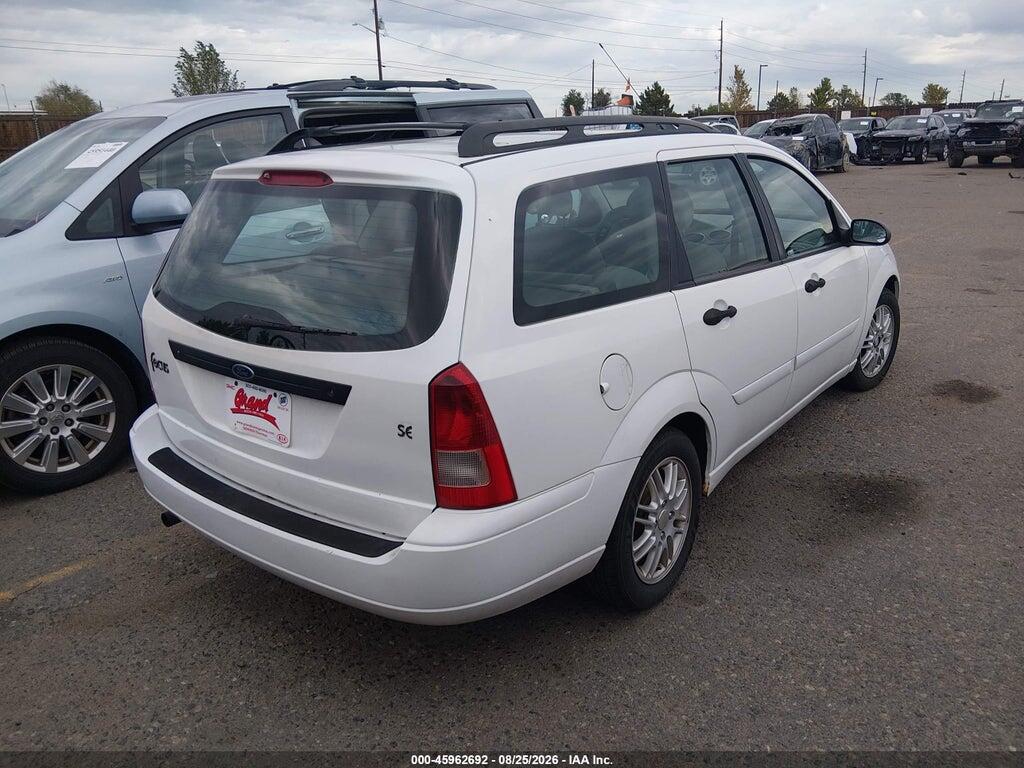1FAFP36342W104523 2002 FORD FOCUS photo no. 4