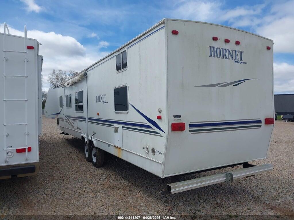 4YDT35F274E310999 2004 KEYSTONE R35 FOOT TRAILER photo no. 3