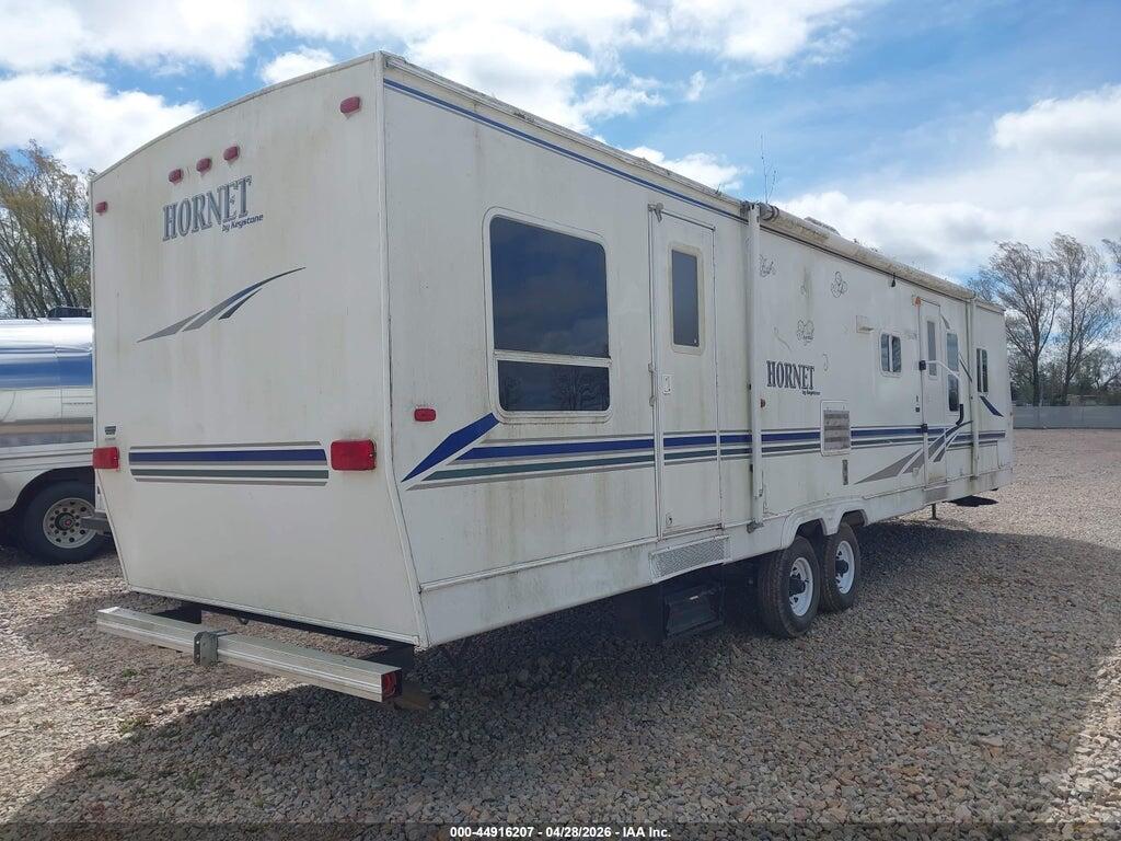 4YDT35F274E310999 2004 KEYSTONE R35 FOOT TRAILER photo no. 4