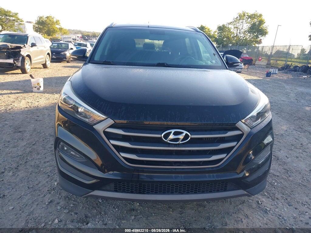 KM8J3CA21GU076712 2016 HYUNDAI TUCSON photo no. 6