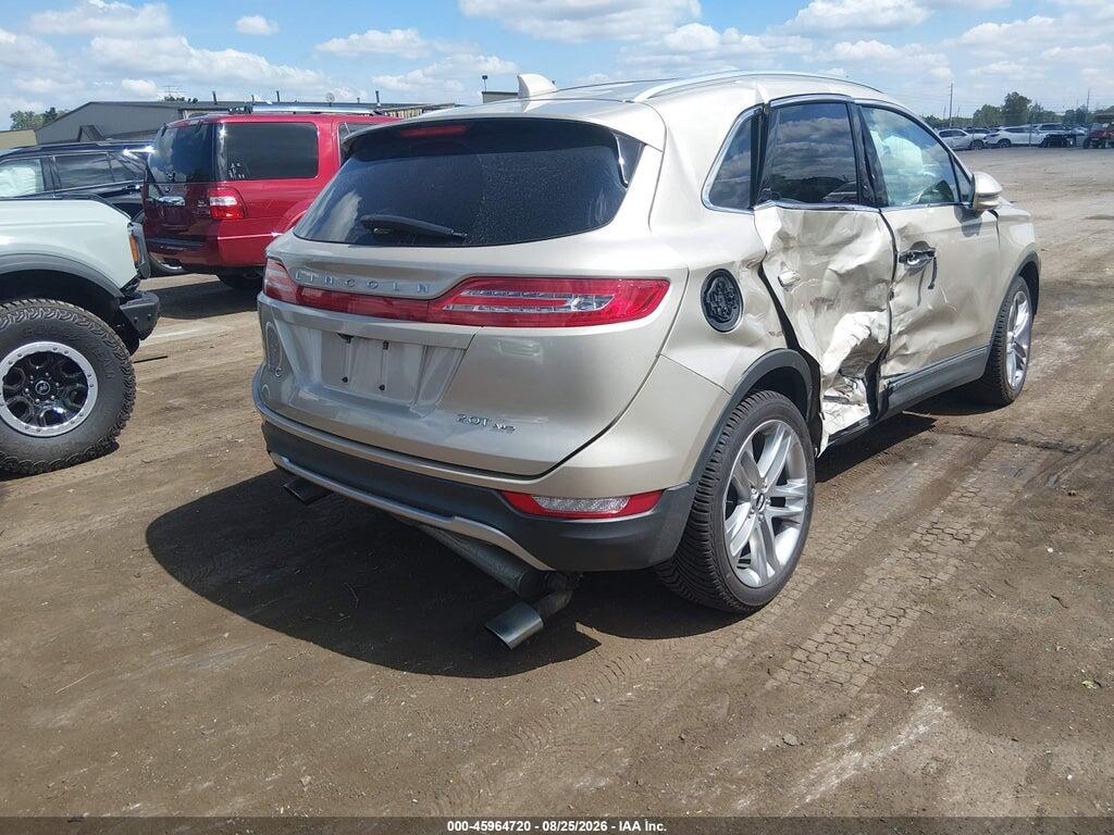 5LMCJ3D99HUL33119 2017 LINCOLN MKC photo no. 4