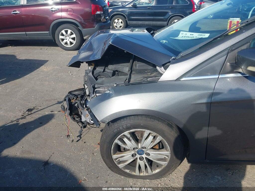 1FAHP3M29CL358749 2012 FORD FOCUS photo no. 11
