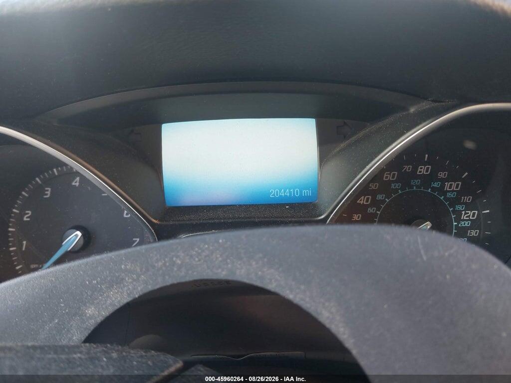 1FAHP3M29CL358749 2012 FORD FOCUS photo no. 7