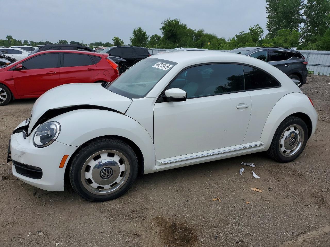 2016 VOLKSWAGEN BEETLE 3VWJ07AT5GM604685