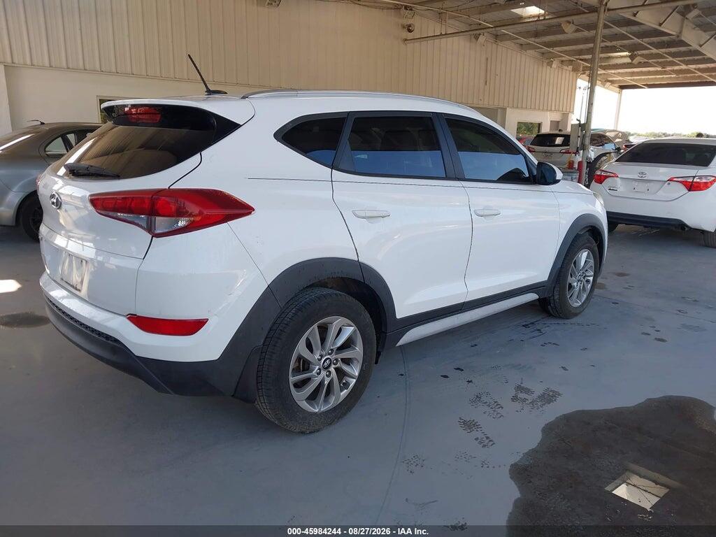KM8J33A47HU506844 2017 HYUNDAI TUCSON photo no. 4