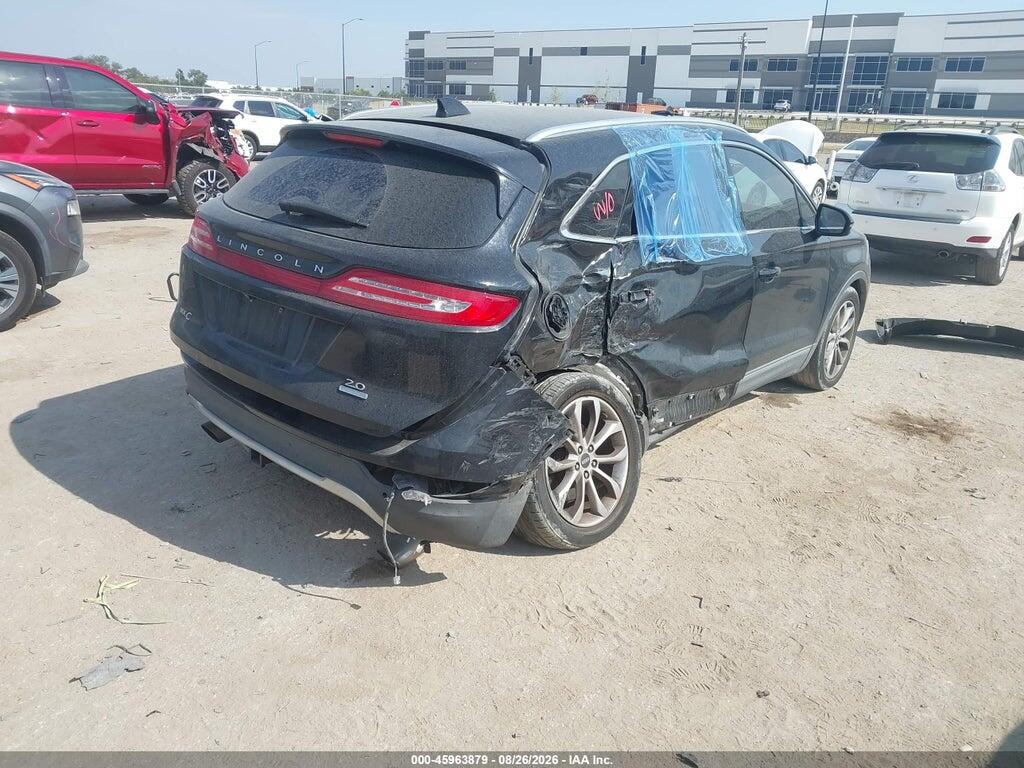 5LMCJ2C98GUJ30880 2016 LINCOLN MKC photo no. 4