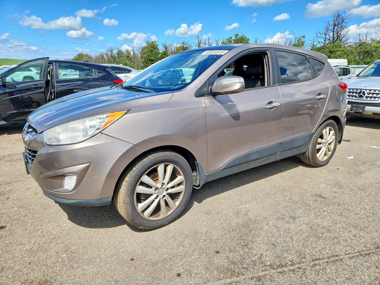 2012 HYUNDAI TUCSON KM8JUCAC8CU375047