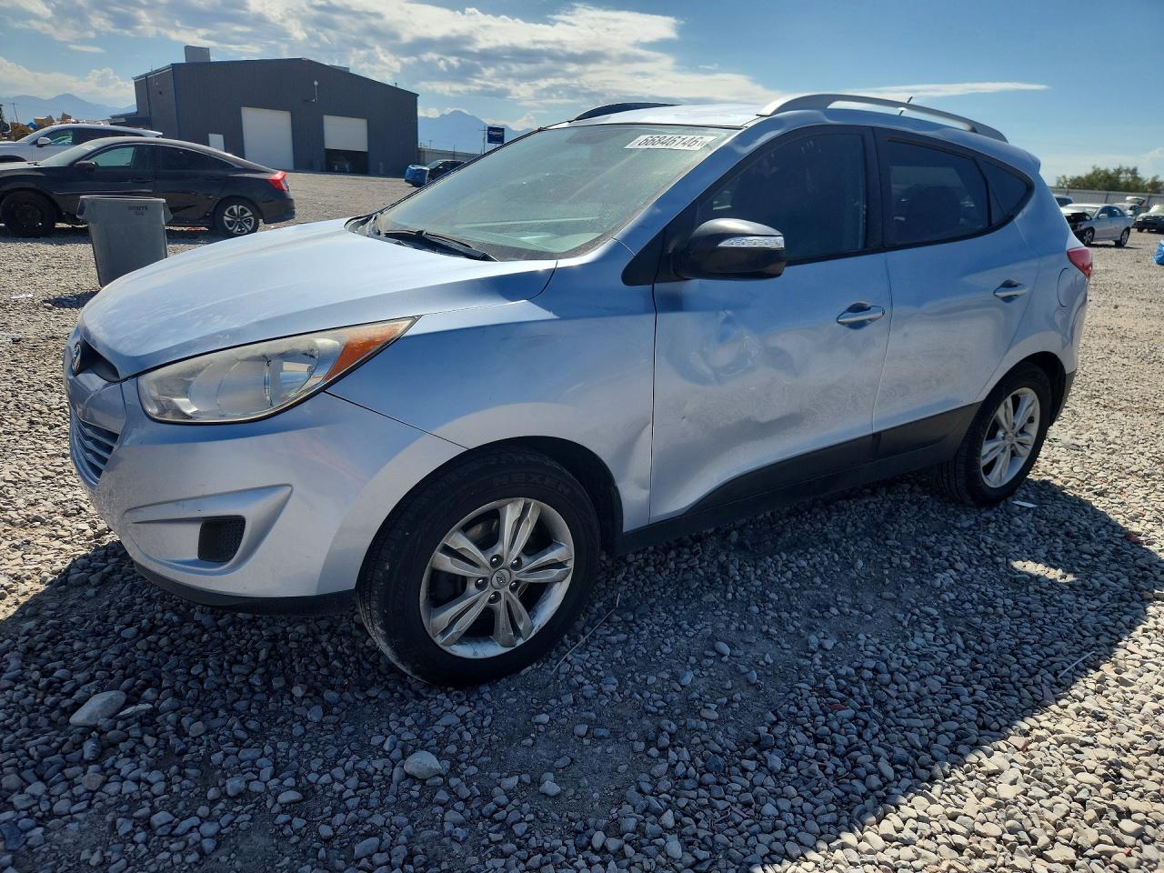 2012 HYUNDAI TUCSON KM8JUCAC6CU379940