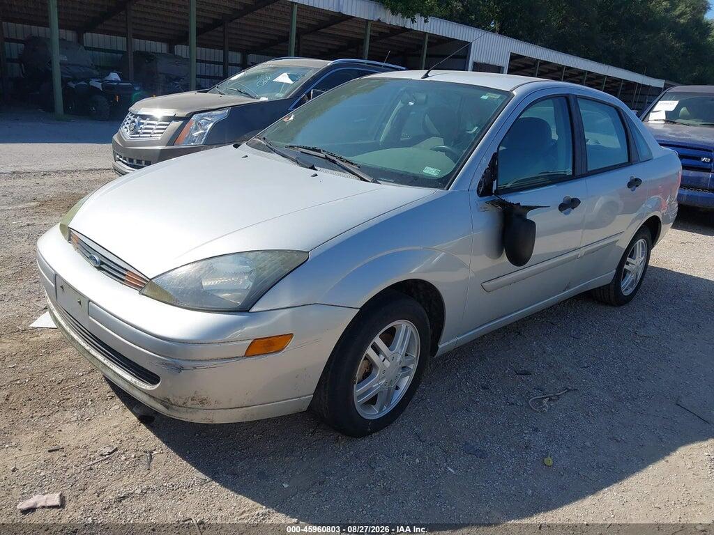 1FAFP38Z74W138556 2004 FORD FOCUS photo no. 2