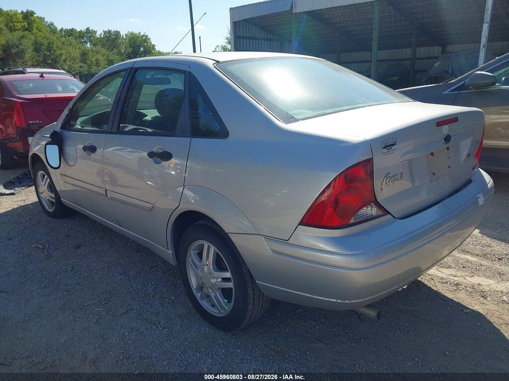 1FAFP38Z74W138556 2004 FORD FOCUS photo no. 3