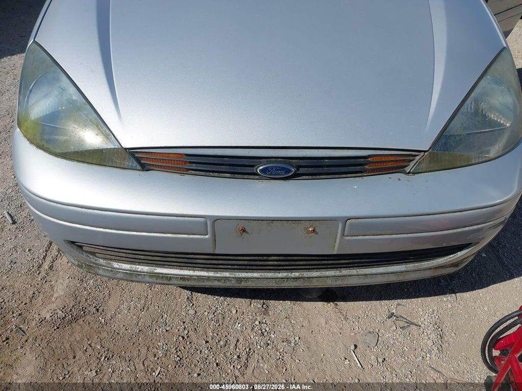 1FAFP38Z74W138556 2004 FORD FOCUS photo no. 6