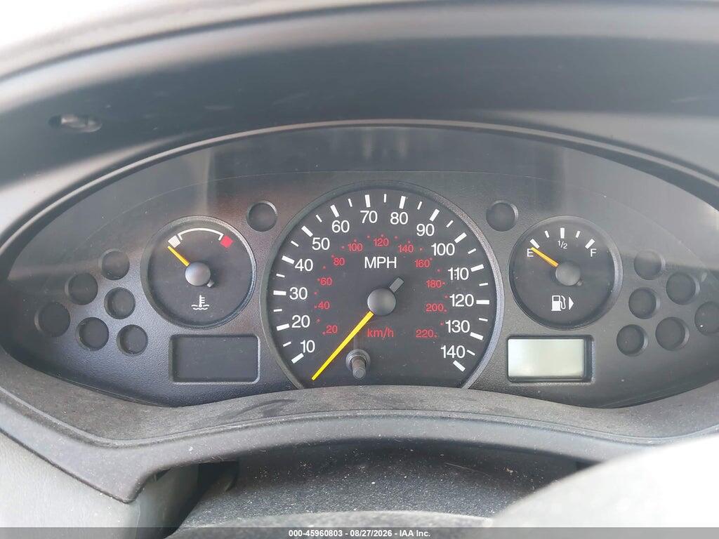 1FAFP38Z74W138556 2004 FORD FOCUS photo no. 7