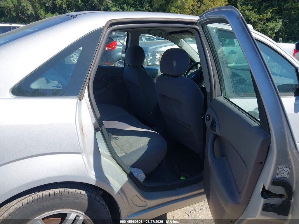 1FAFP38Z74W138556 2004 FORD FOCUS photo no. 8