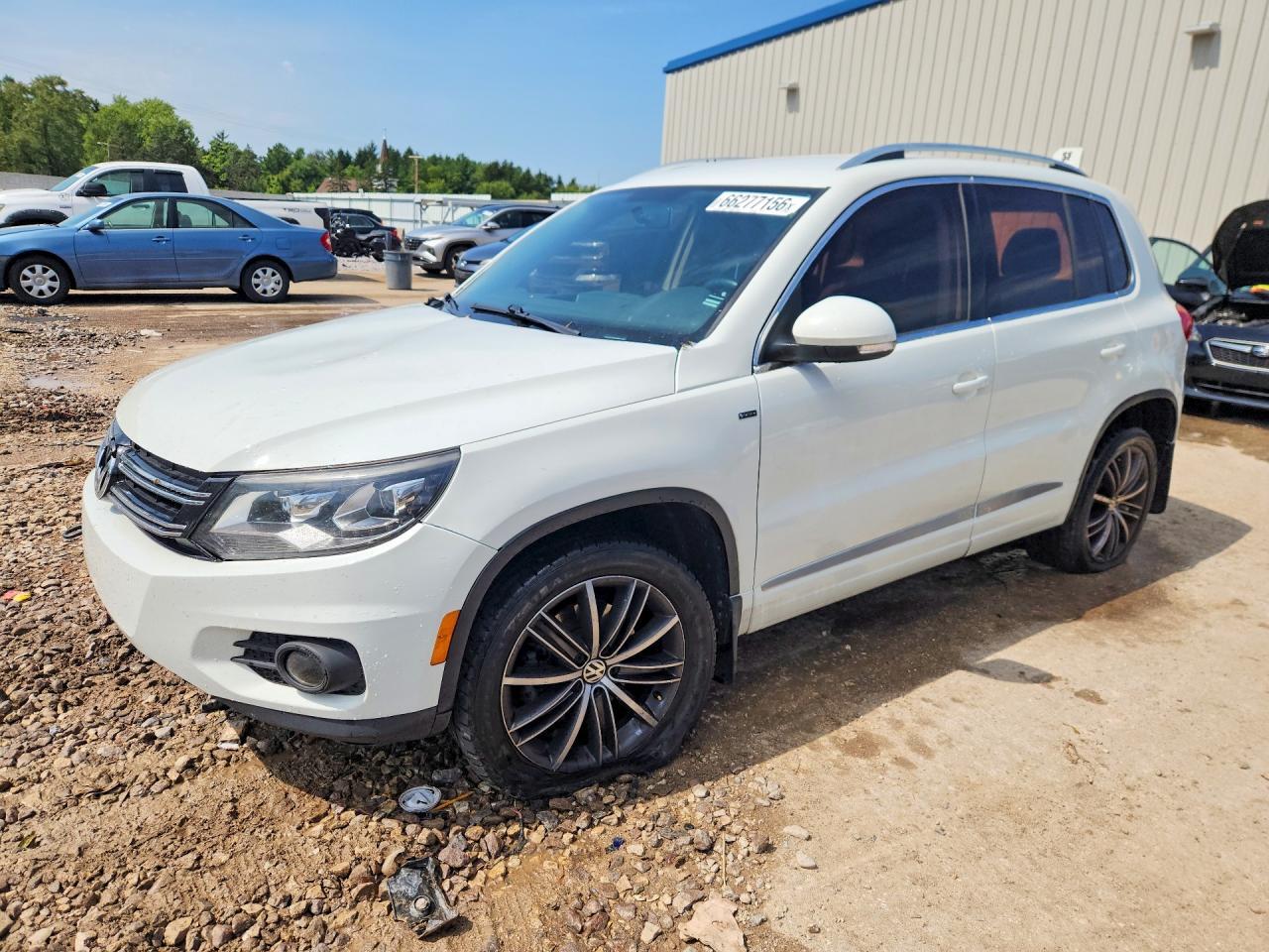 2015 VOLKSWAGEN TIGUAN WVGAV7AX8FW519695