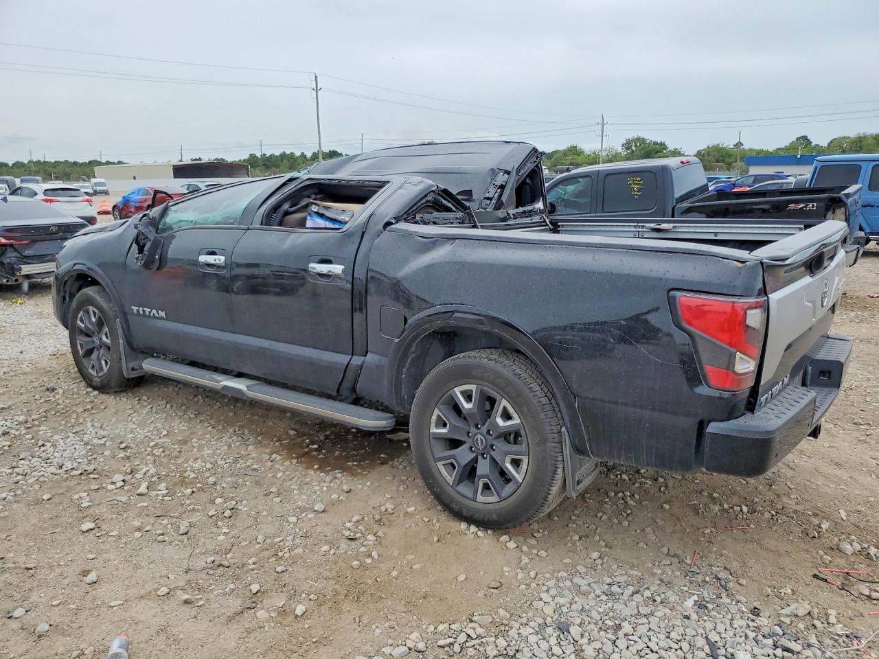2023 NISSAN TITAN PLATINUM RESERVE — Фото 2 из 12