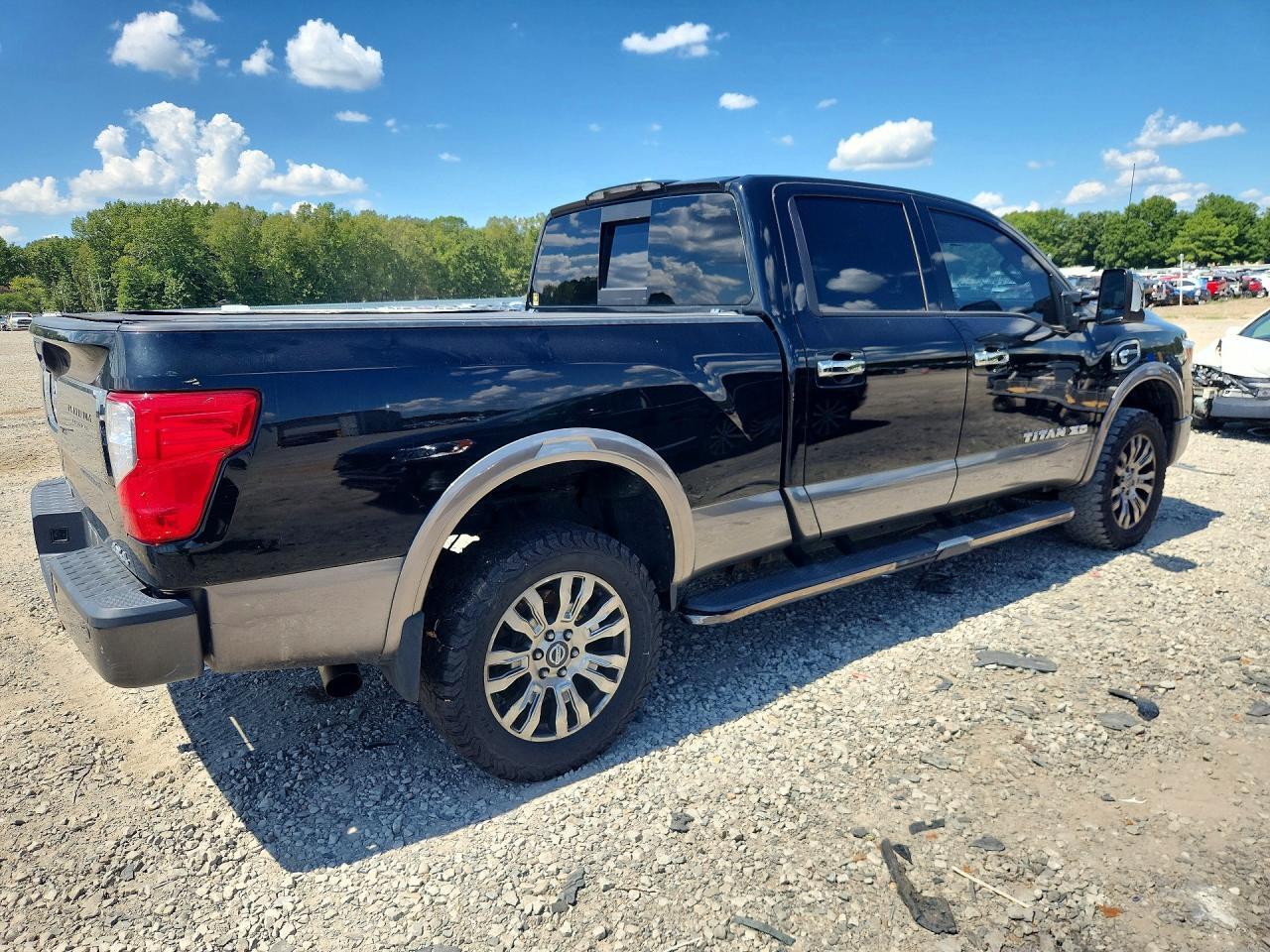 2018 NISSAN TITAN XD PLATINUM RESERVE — Фото 3 из 12