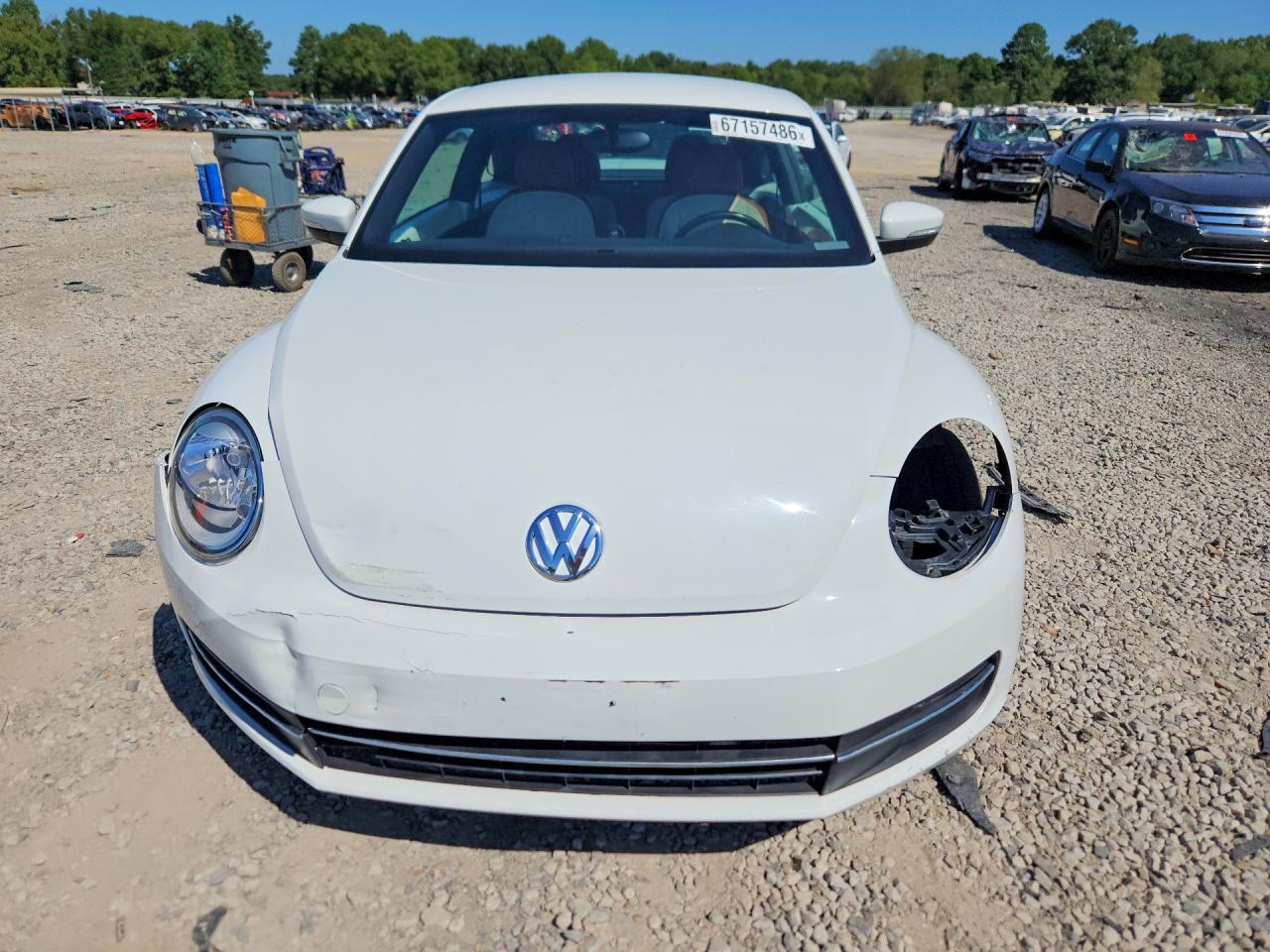 2016 VOLKSWAGEN BEETLE 1.8T — Фото 5 из 12