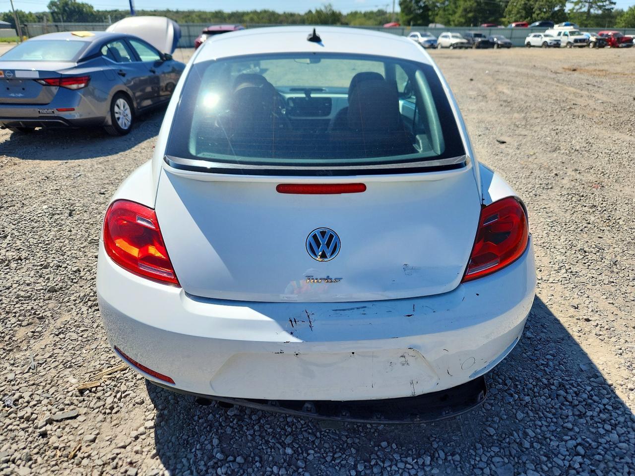 2016 VOLKSWAGEN BEETLE 1.8T — Фото 6 из 12