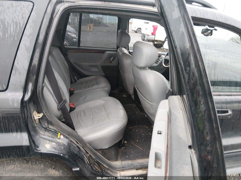 1J8GW68J43C521196 2003 JEEP GRAND CHEROKEE photo no. 8