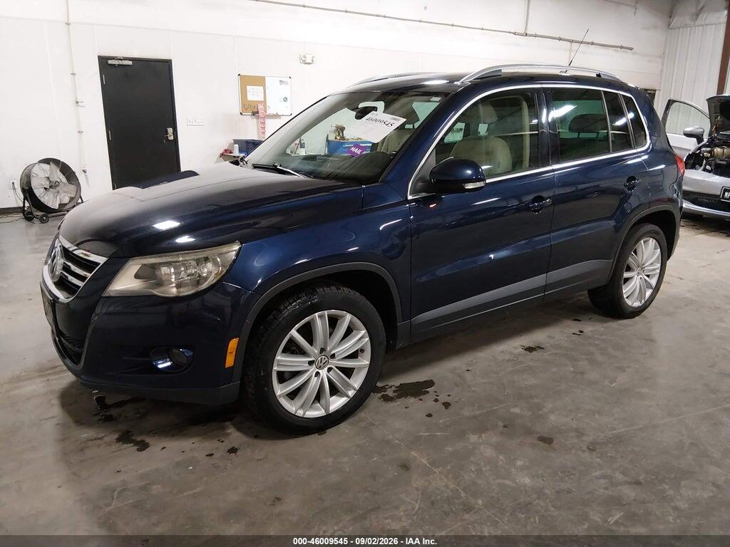 WVGBV7AX0BW520306 2011 VOLKSWAGEN TIGUAN photo no. 2