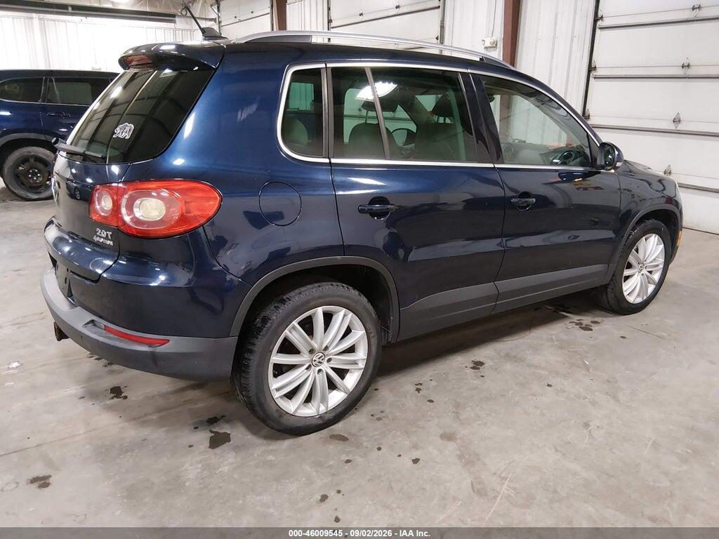 WVGBV7AX0BW520306 2011 VOLKSWAGEN TIGUAN photo no. 4