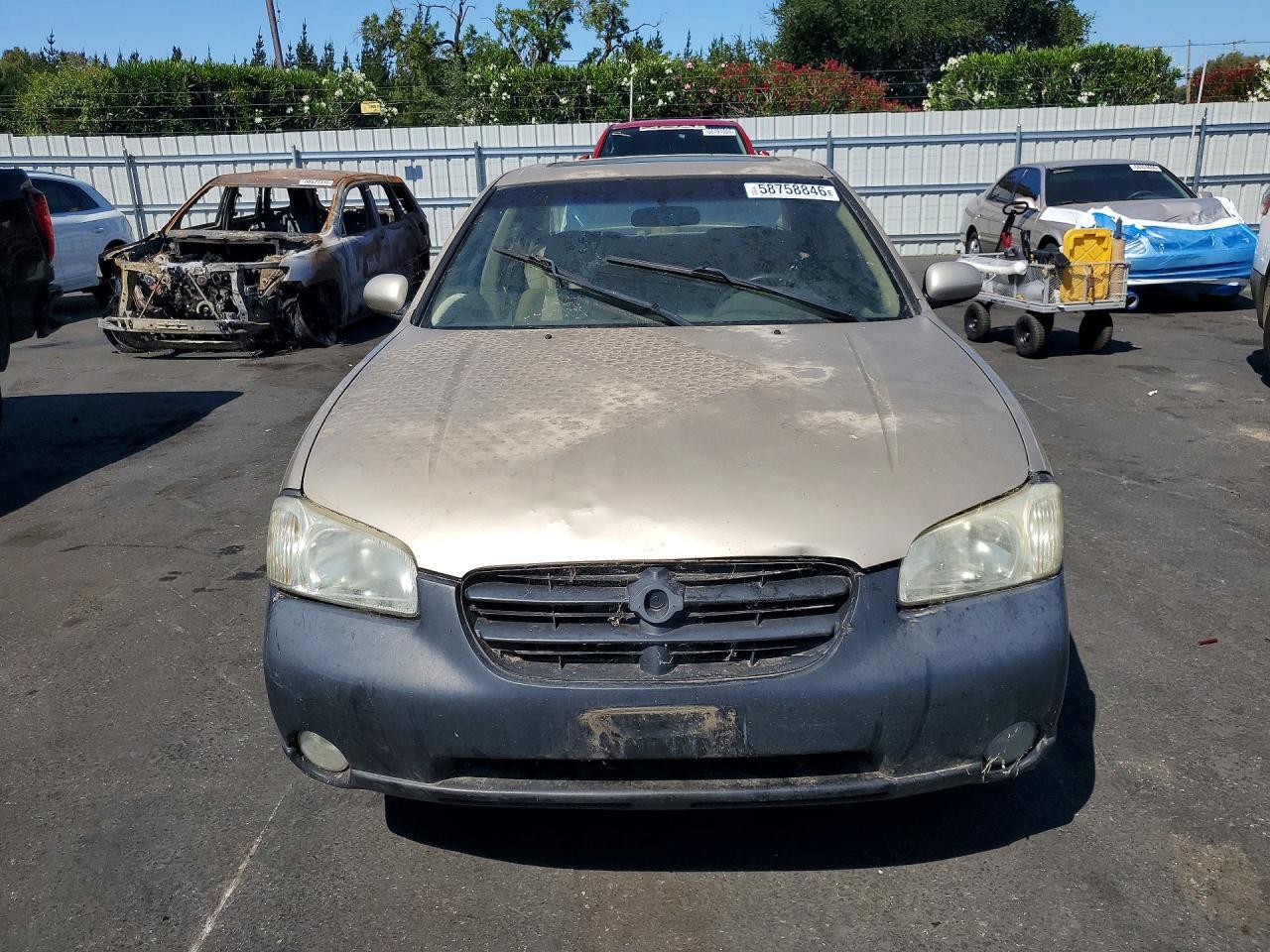 JN1CA31A1YT004249 2000 NISSAN MAXIMA photo no. 5
