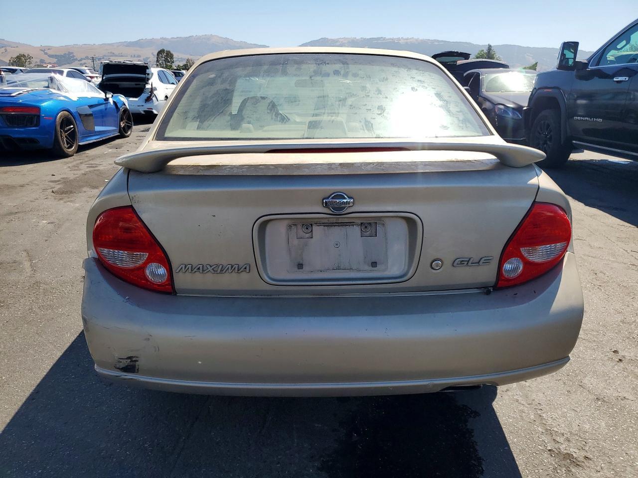JN1CA31A1YT004249 2000 NISSAN MAXIMA photo no. 6