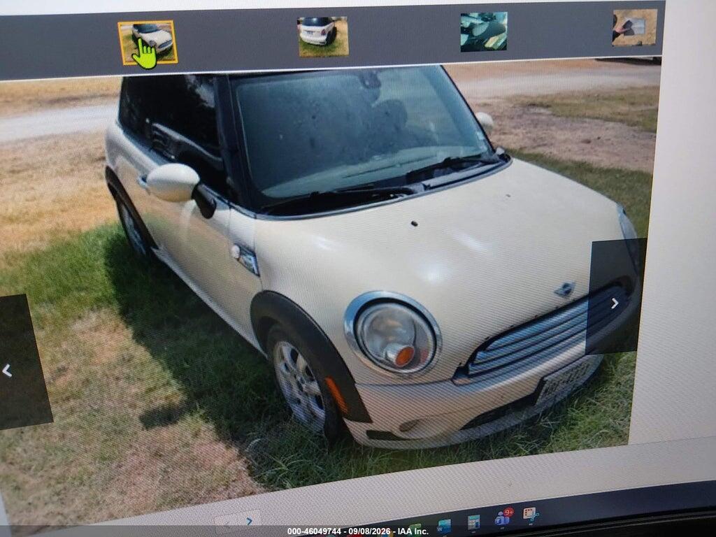 2009 MINI COOPER WMWMF33549TT69283