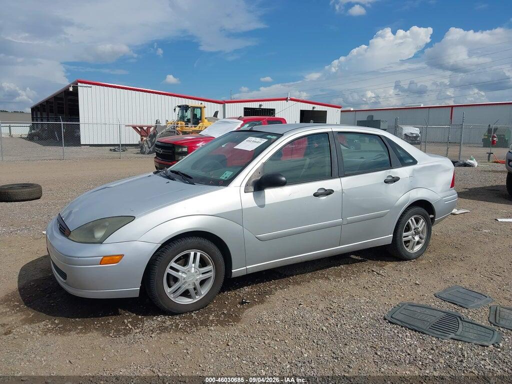 1FAFP343X4W180639 2004 FORD FOCUS photo no. 6