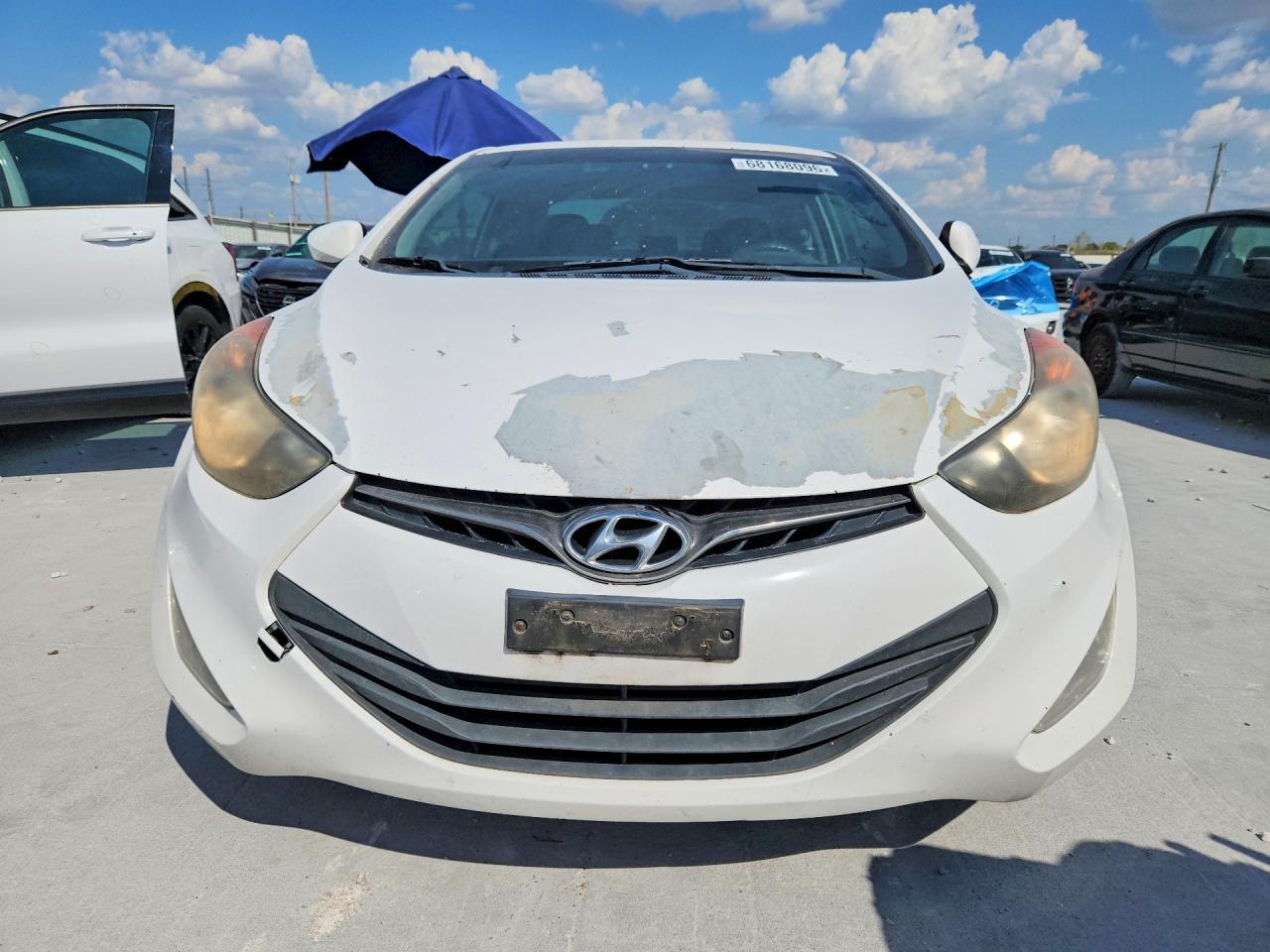 KMHDH6AE4DU014386 2013 HYUNDAI ELANTRA COUPE photo no. 5