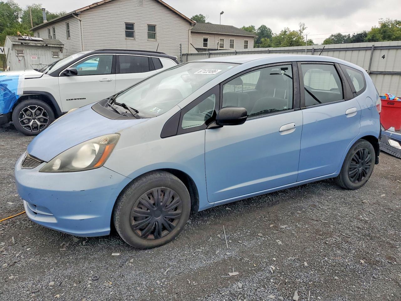 2009 HONDA FIT JHMGE88299C005776