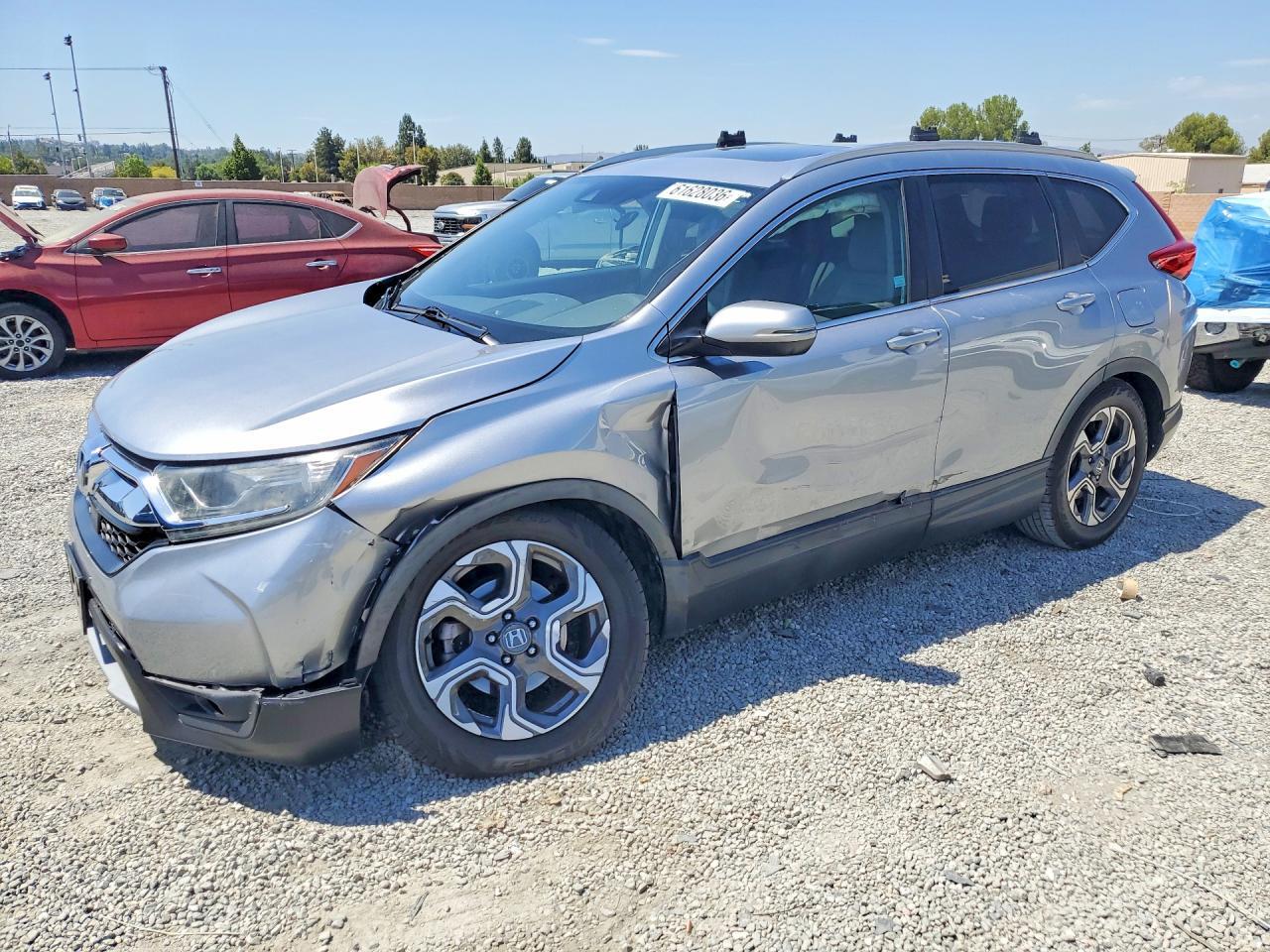 2017 HONDA CR-V 7FARW1H59HE005582