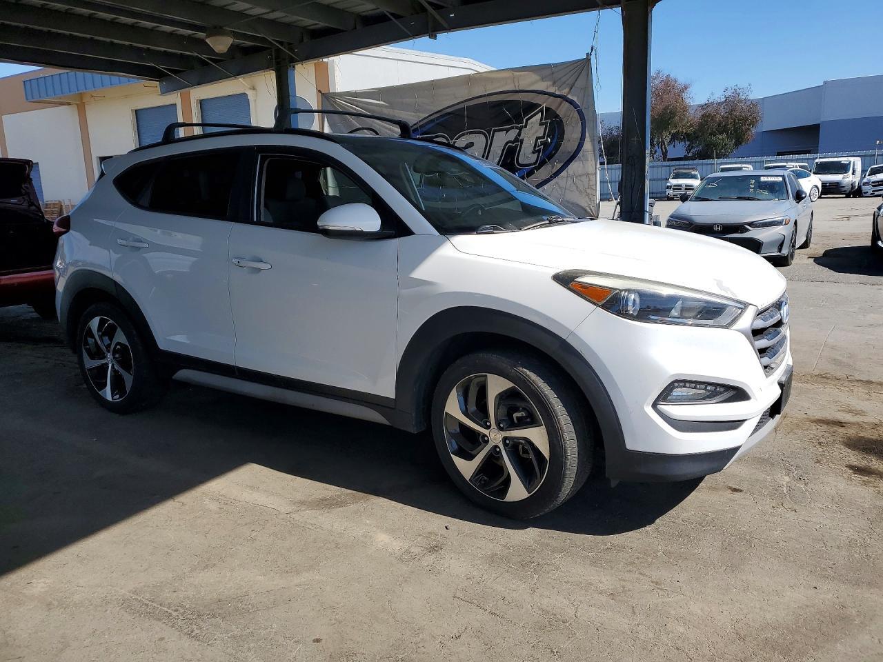 KM8J3CA24JU742937 2018 HYUNDAI TUCSON photo no. 4