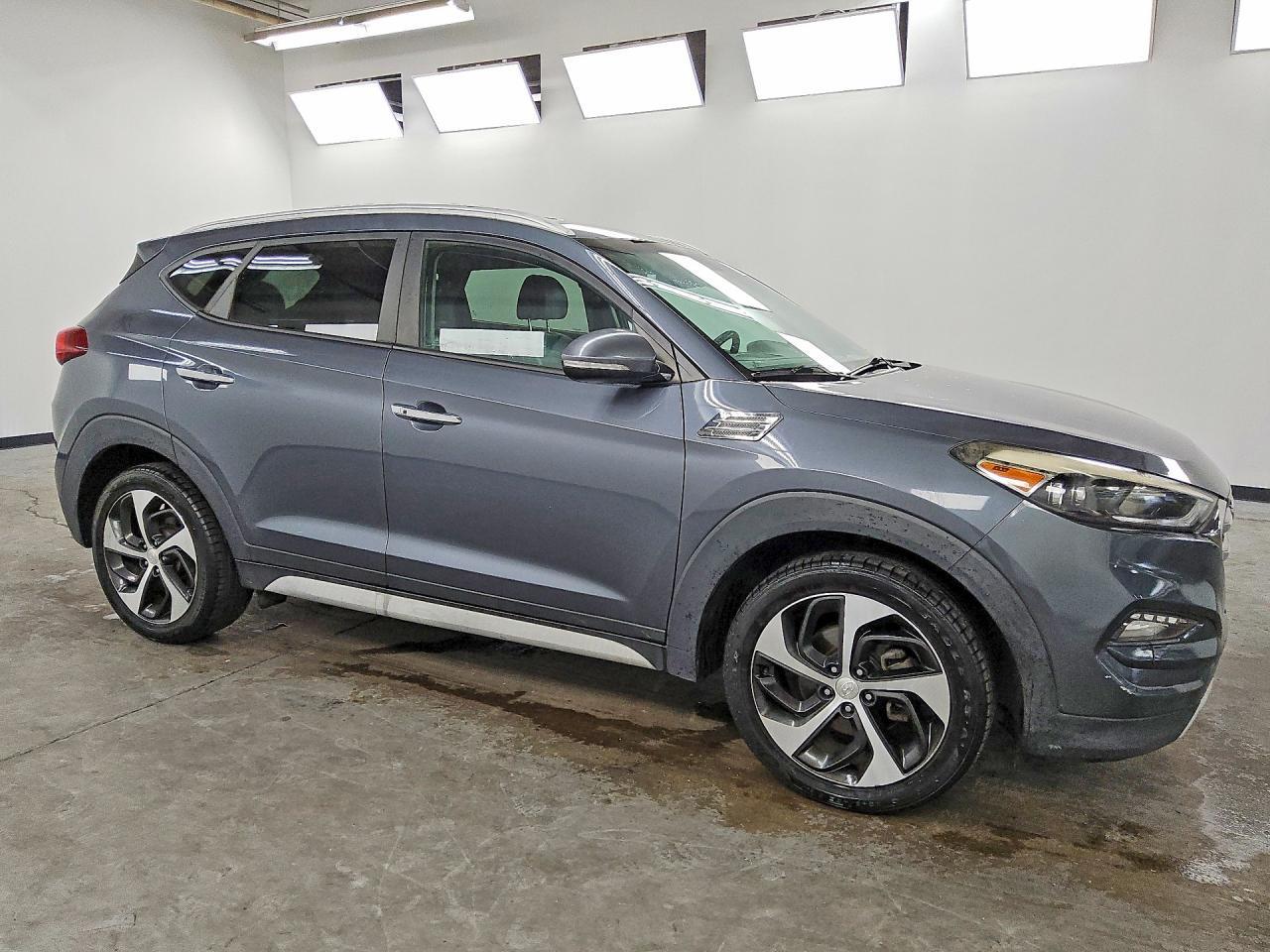 KM8J3CA26HU380717 2017 HYUNDAI TUCSON photo no. 4