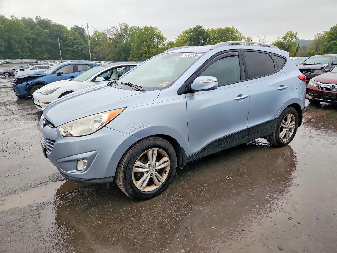 2013 HYUNDAI TUCSON KM8JUCAC0DU566575