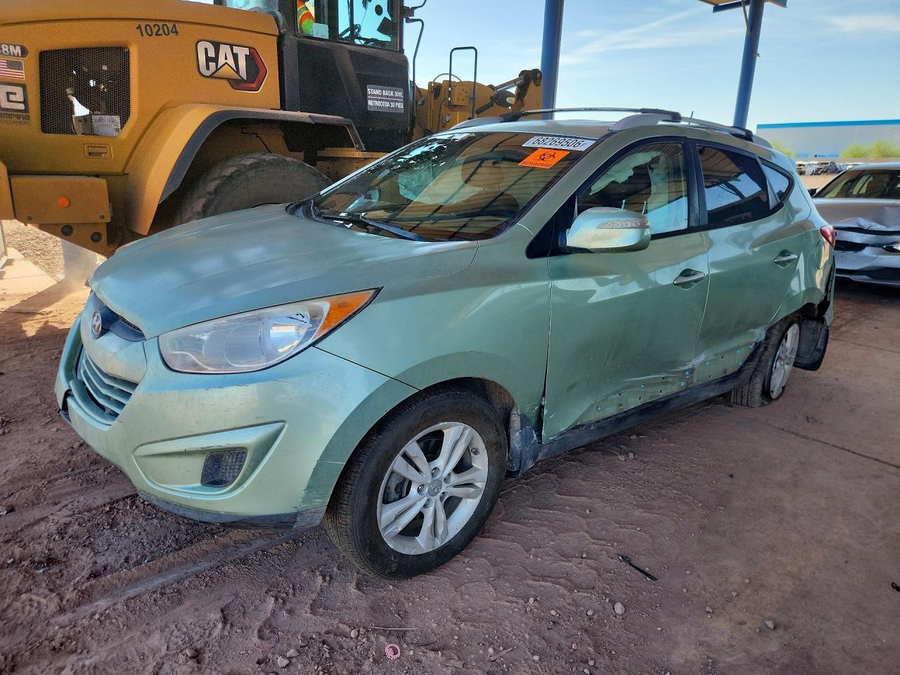 2012 HYUNDAI TUCSON KM8JUCAC9CU351467