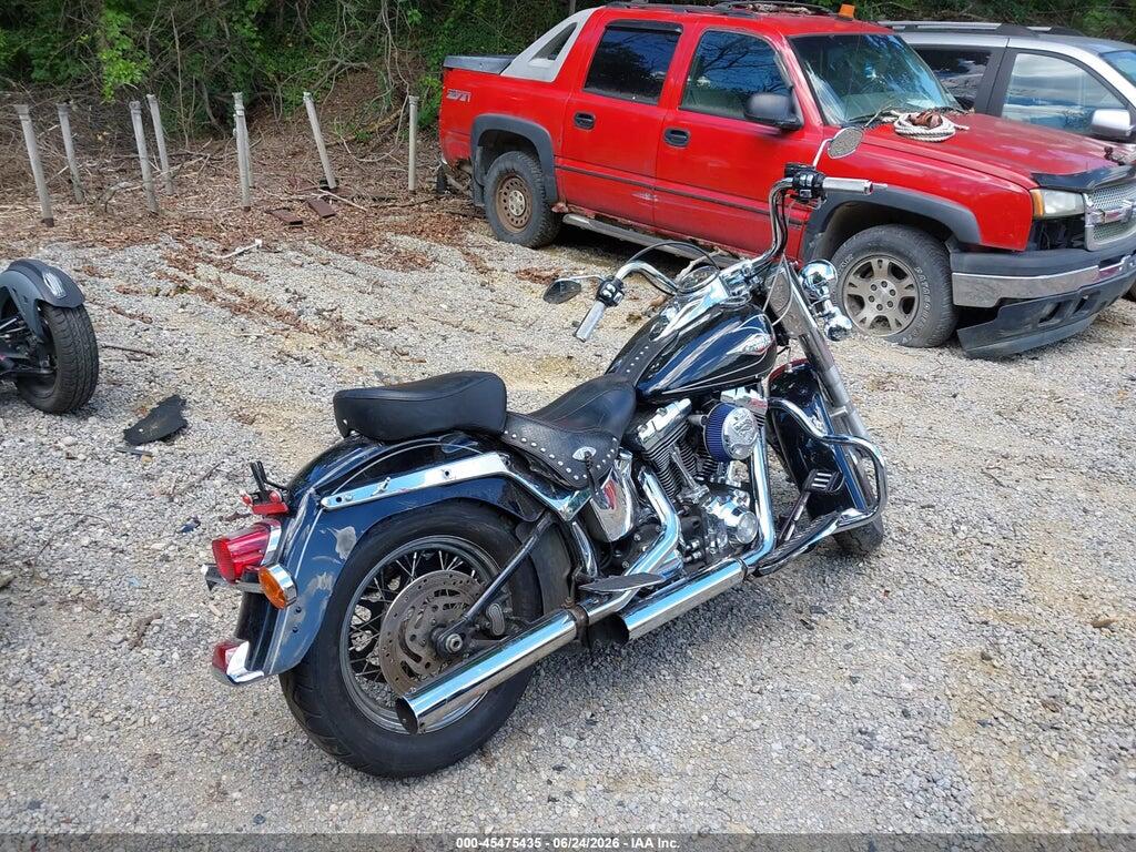 1HD1BW513BB041702 2011 HARLEY-DAVIDSON FLSTC photo no. 4