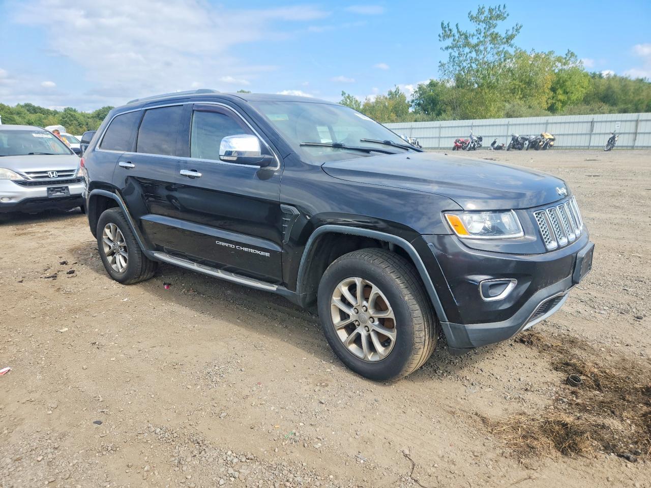 2014 JEEP GRAND CHEROKEE LIMITED — Фото 4 из 13