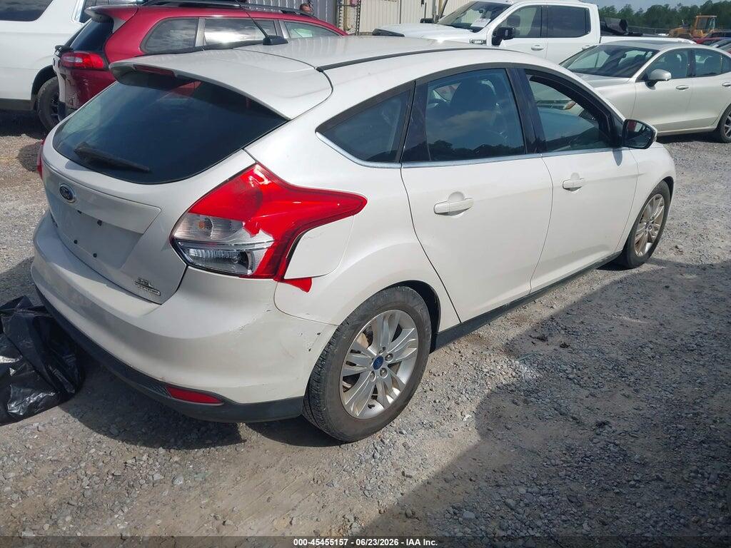 1FAHP3M24CL473047 2012 FORD FOCUS photo no. 4