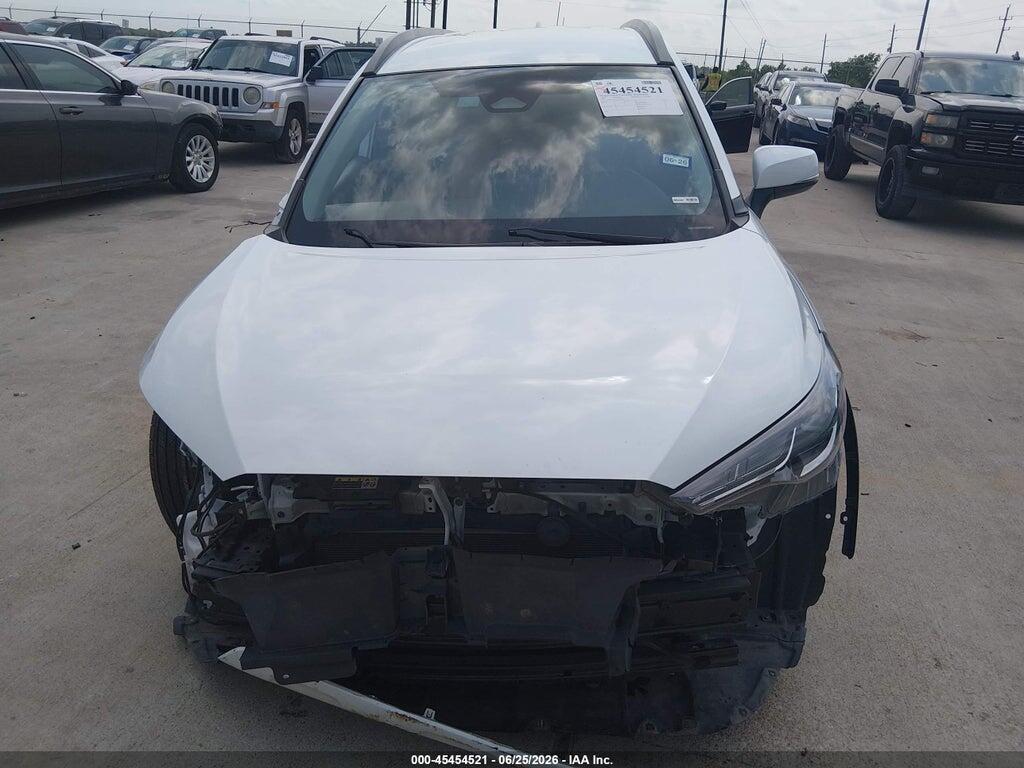 7MUCAAAG7PV059927 2023 TOYOTA COROLLA CROSS photo no. 12
