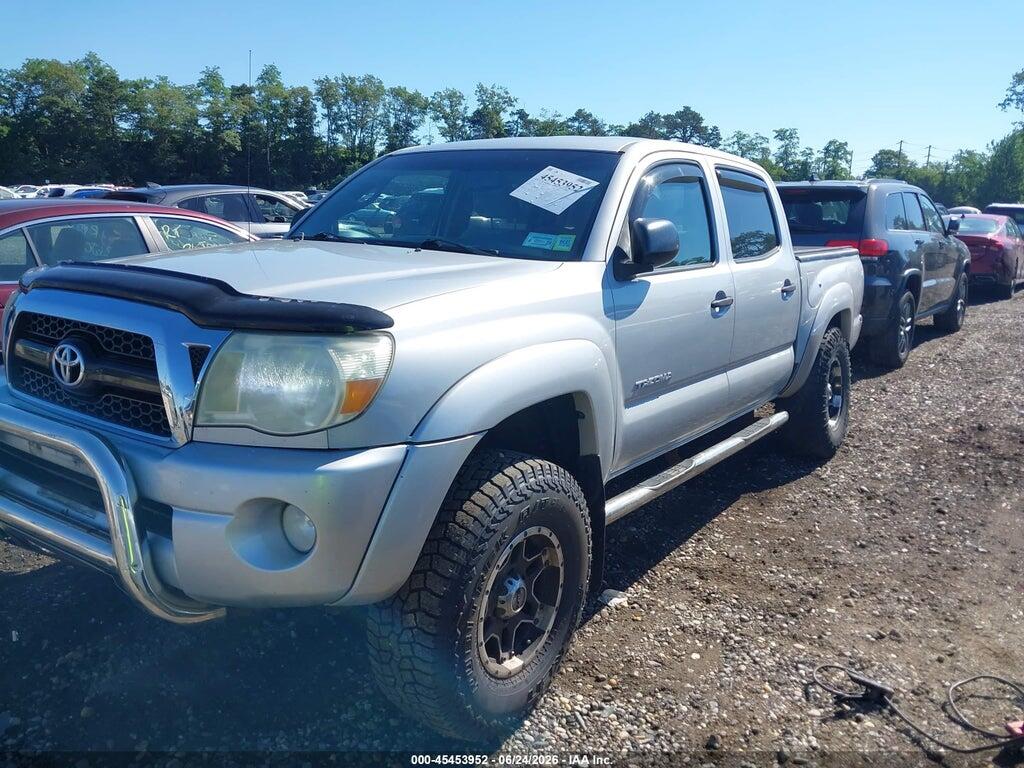 3TMLU4ENXBM071994 2011 TOYOTA TACOMA photo no. 2