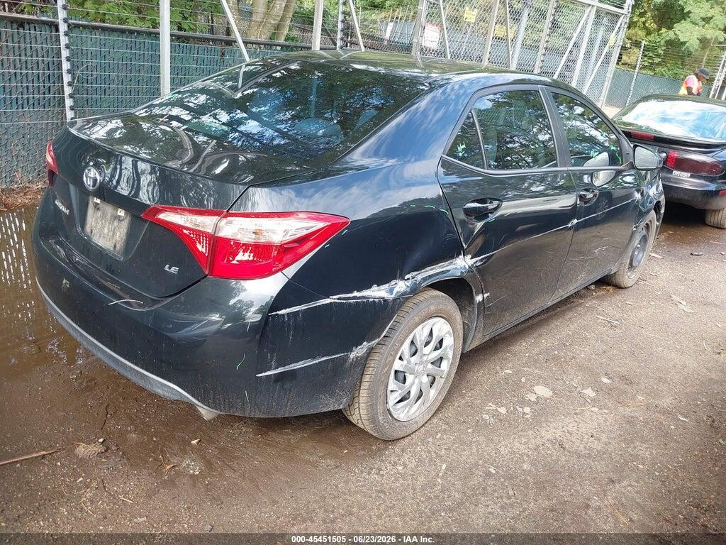 5YFBURHE9HP735370 2017 TOYOTA COROLLA photo no. 4