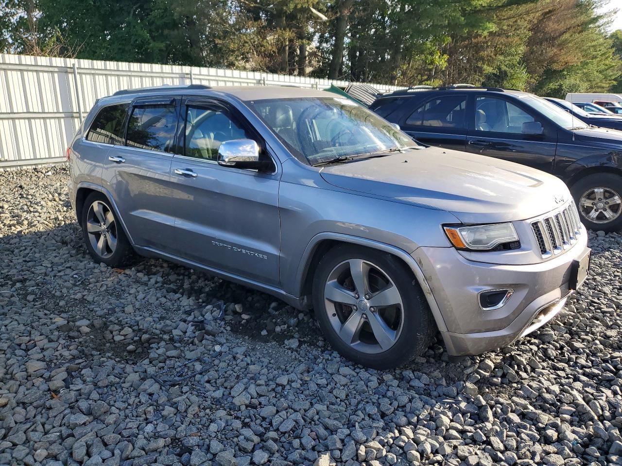 2014 JEEP GRAND CHEROKEE OVERLAND — Фото 4 из 13