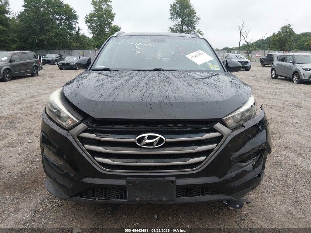 KM8J3CA4XGU074717 2016 HYUNDAI TUCSON photo no. 11
