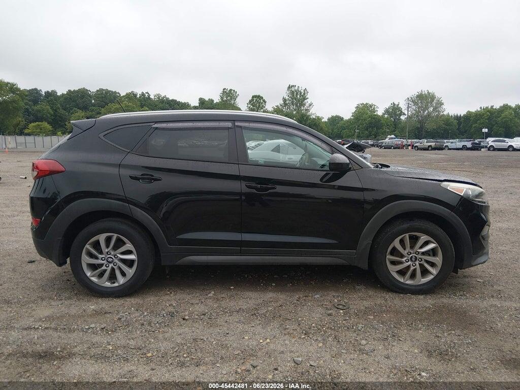 KM8J3CA4XGU074717 2016 HYUNDAI TUCSON photo no. 12