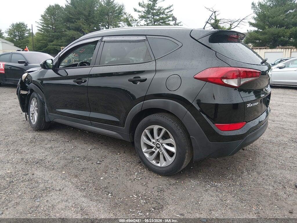 KM8J3CA4XGU074717 2016 HYUNDAI TUCSON photo no. 3
