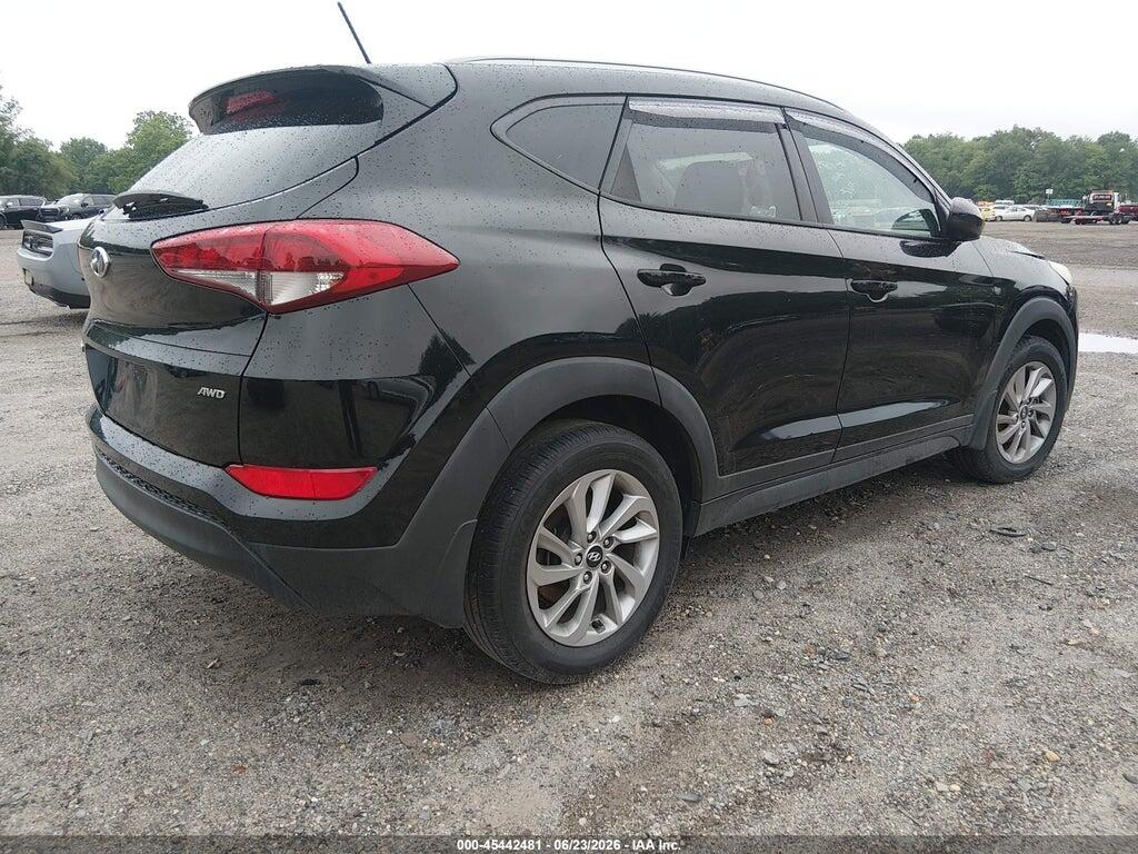 KM8J3CA4XGU074717 2016 HYUNDAI TUCSON photo no. 4