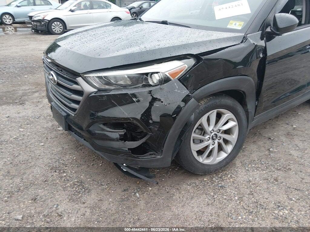KM8J3CA4XGU074717 2016 HYUNDAI TUCSON photo no. 6