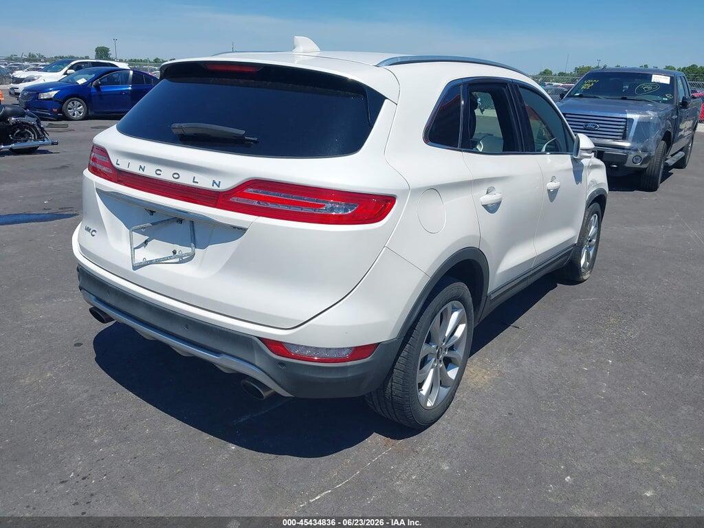 5LMCJ2D94KUL44403 2019 LINCOLN MKC photo no. 4