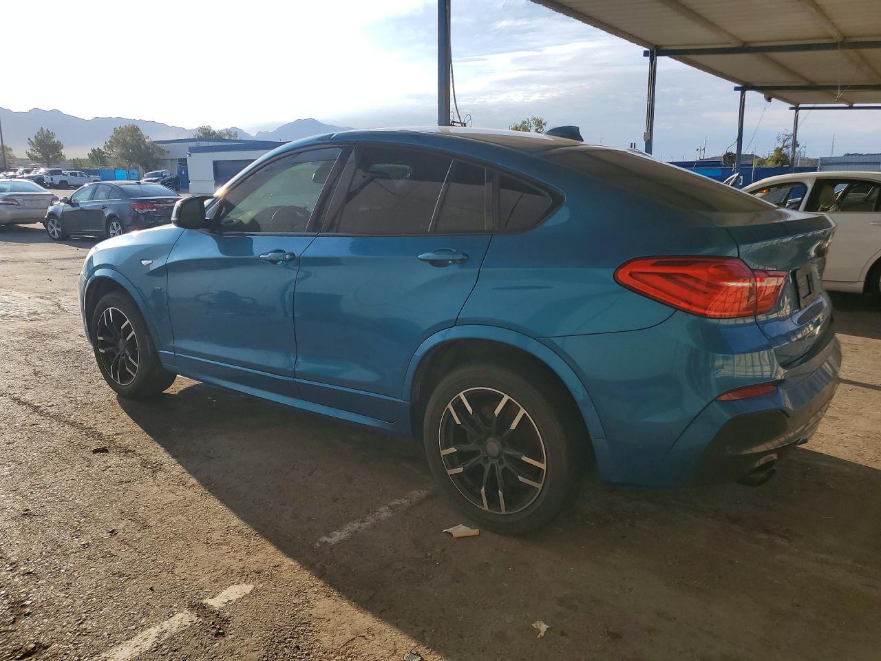 2017 BMW X4 XDRIVEM40I — Фото 2 из 12